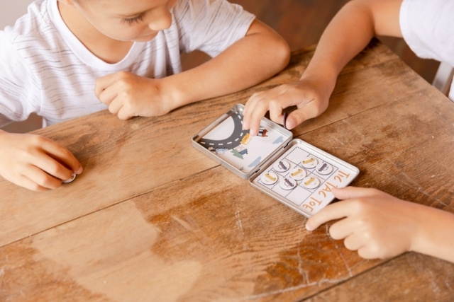 Boys Playing Tic Tac Toe