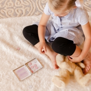 Girl Playing Tic Tac Toe Donut