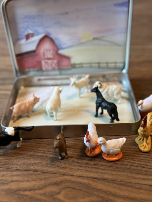 Large Farm Animal Tin with Animals close up on table