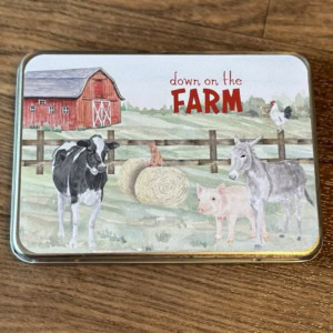 Large Farm Animal Tin closed on table