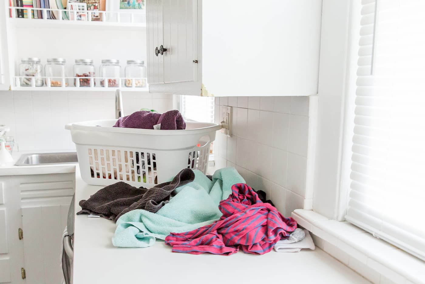 Laundry to Fold on Kitchen Countertop