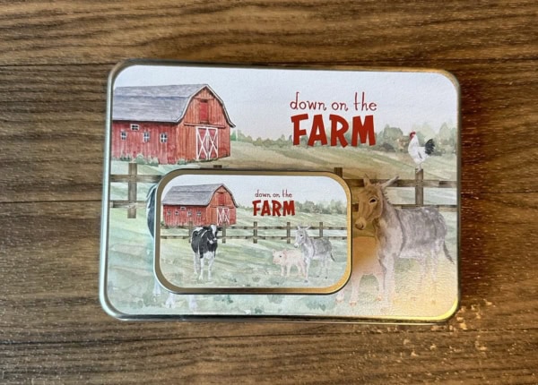 Mini Farm Animal Tin on top of Large Farm Animal Tin