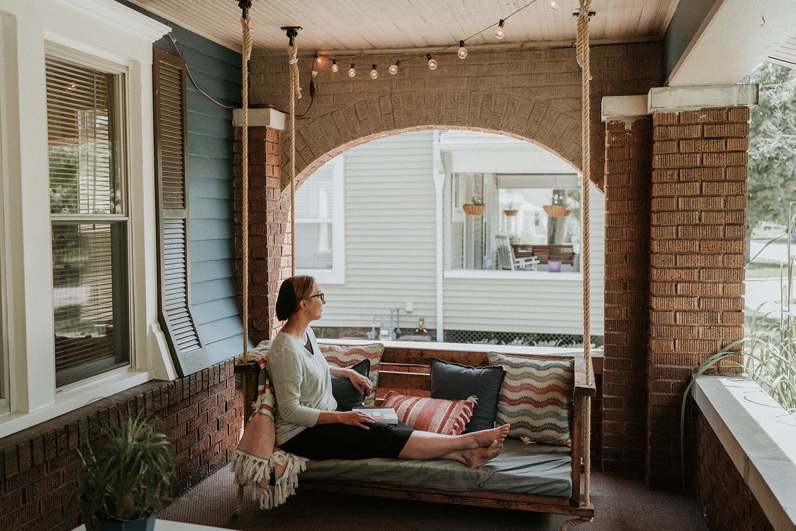 Sitting on Porch Swing with 2022 Weekly Planner